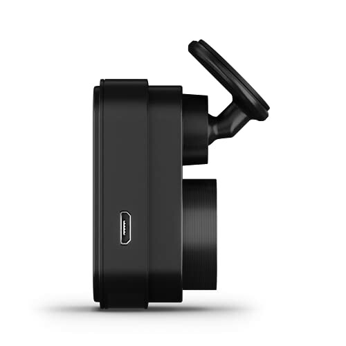 Side view of a black action camera with a mount.
